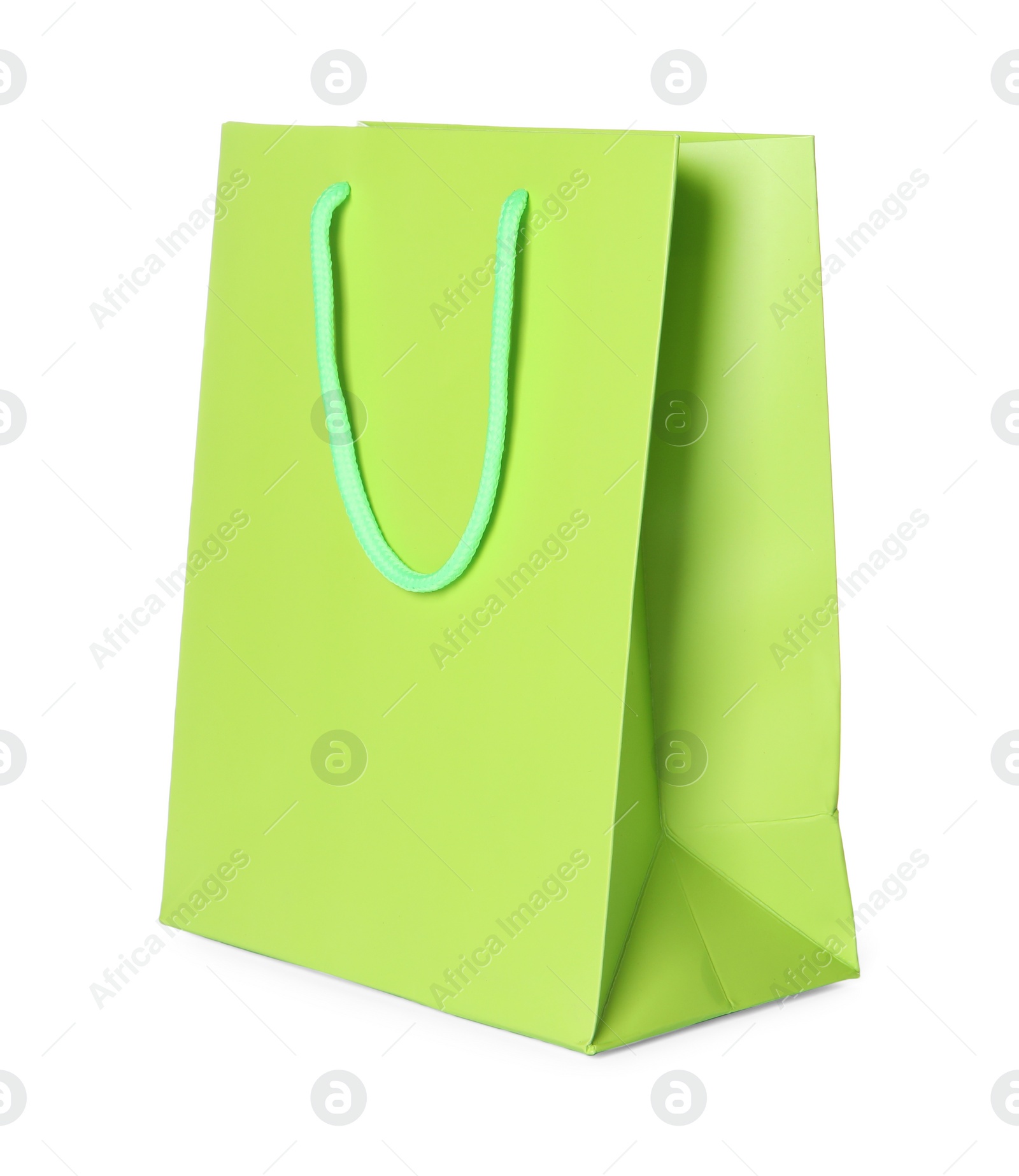 Photo of One green shopping bag isolated on white