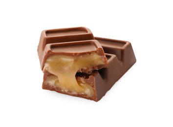 Photo of Pieces of delicious chocolate bar on white background