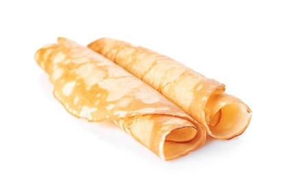 Photo of Hot tasty thin pancakes on white background