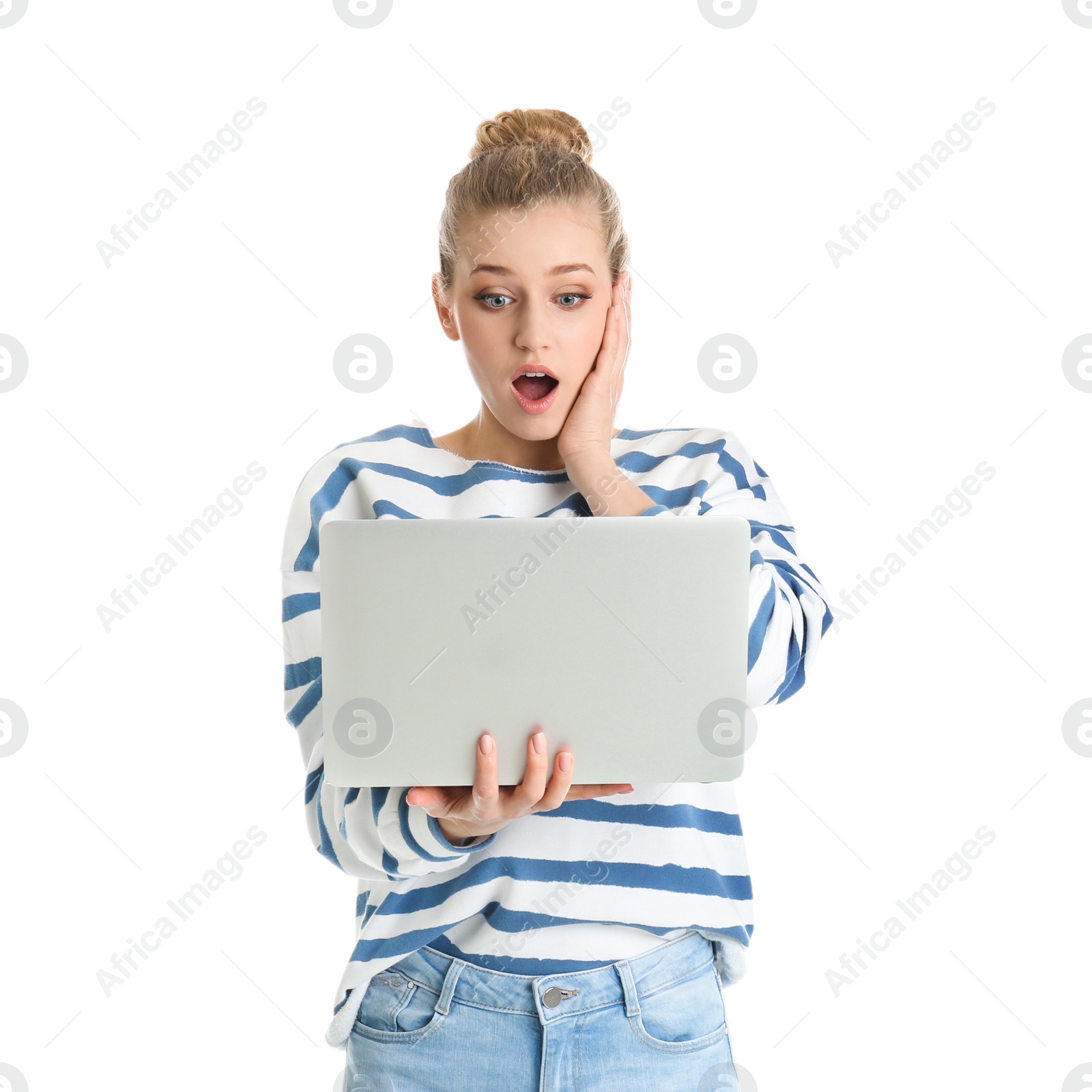 Photo of Portrait of emotional young woman with laptop isolated on white