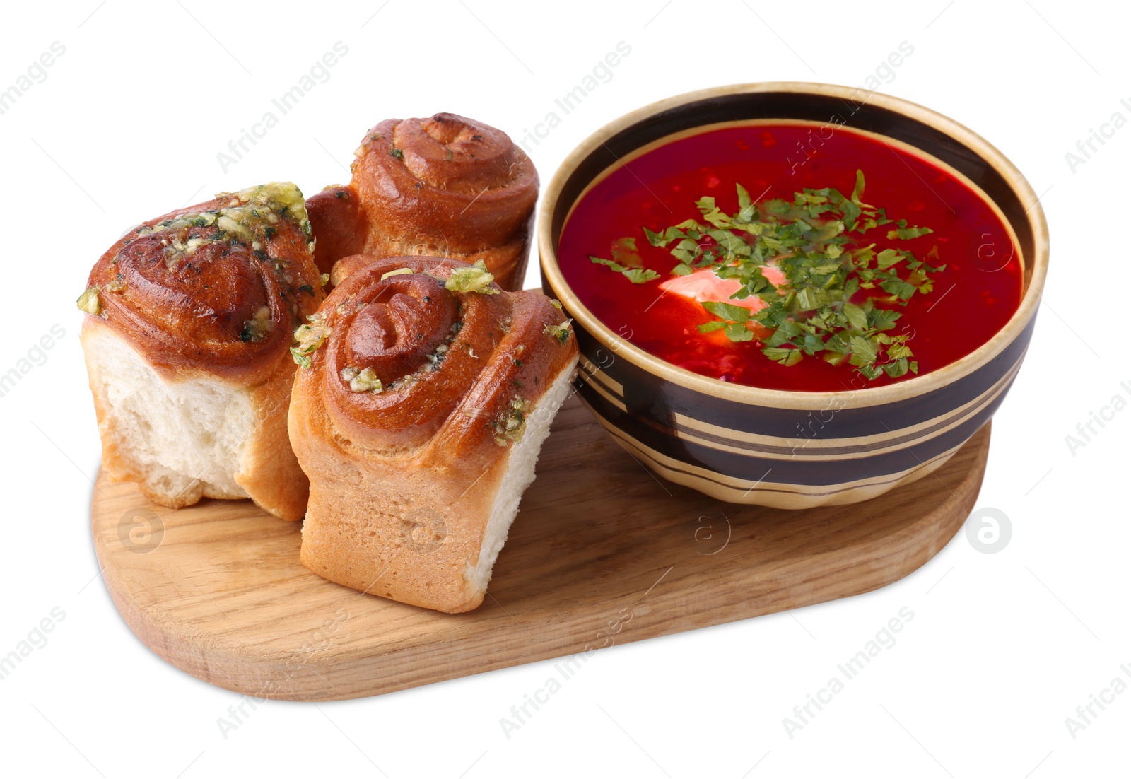 Photo of Tasty fresh pampushky and borsch. Traditional Ukrainian buns with garlic and beet soup isolated on white