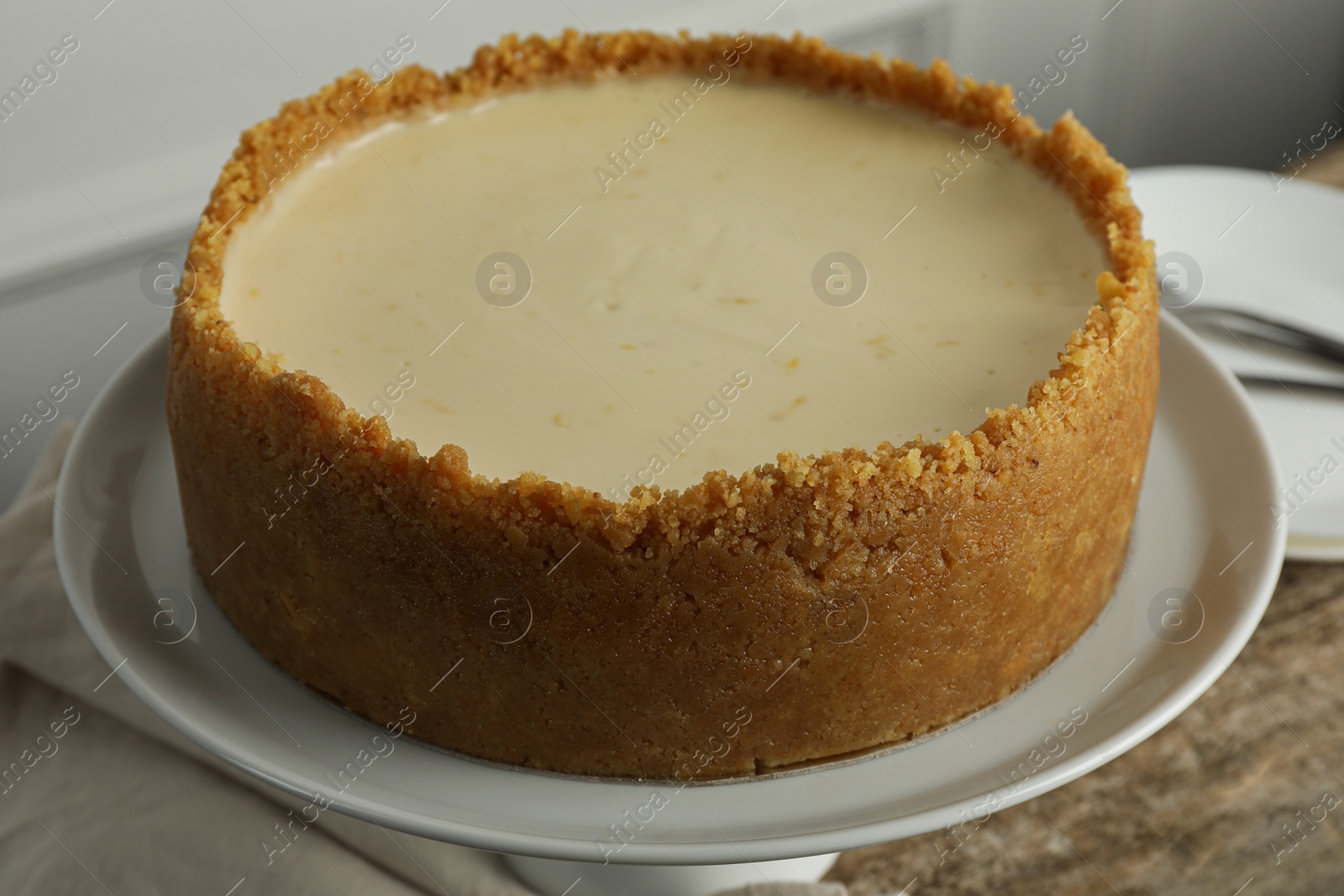 Photo of Tasty vegan tofu cheesecake on table, closeup