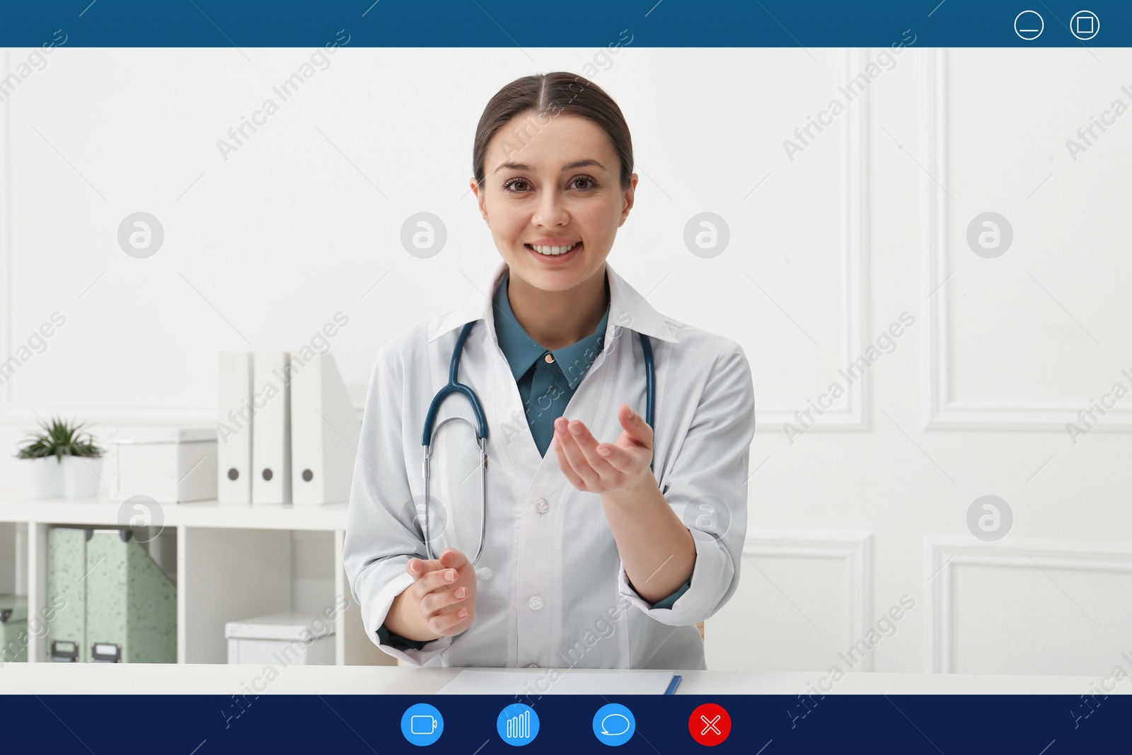 Image of Pediatrician consulting patient online using video chat in clinic, view from webcam