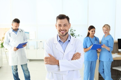 Photo of Doctor and medical assistants in clinic. Health care service