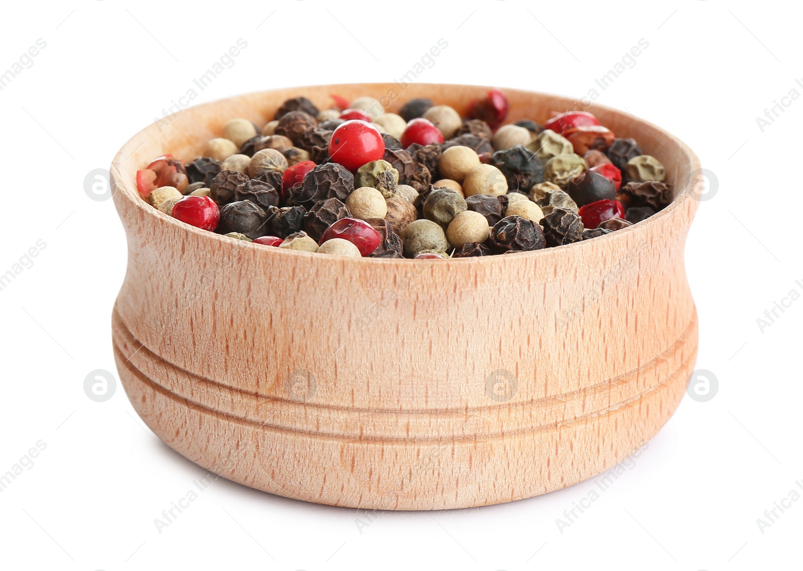 Photo of Bowl of mixed peppercorns isolated on white