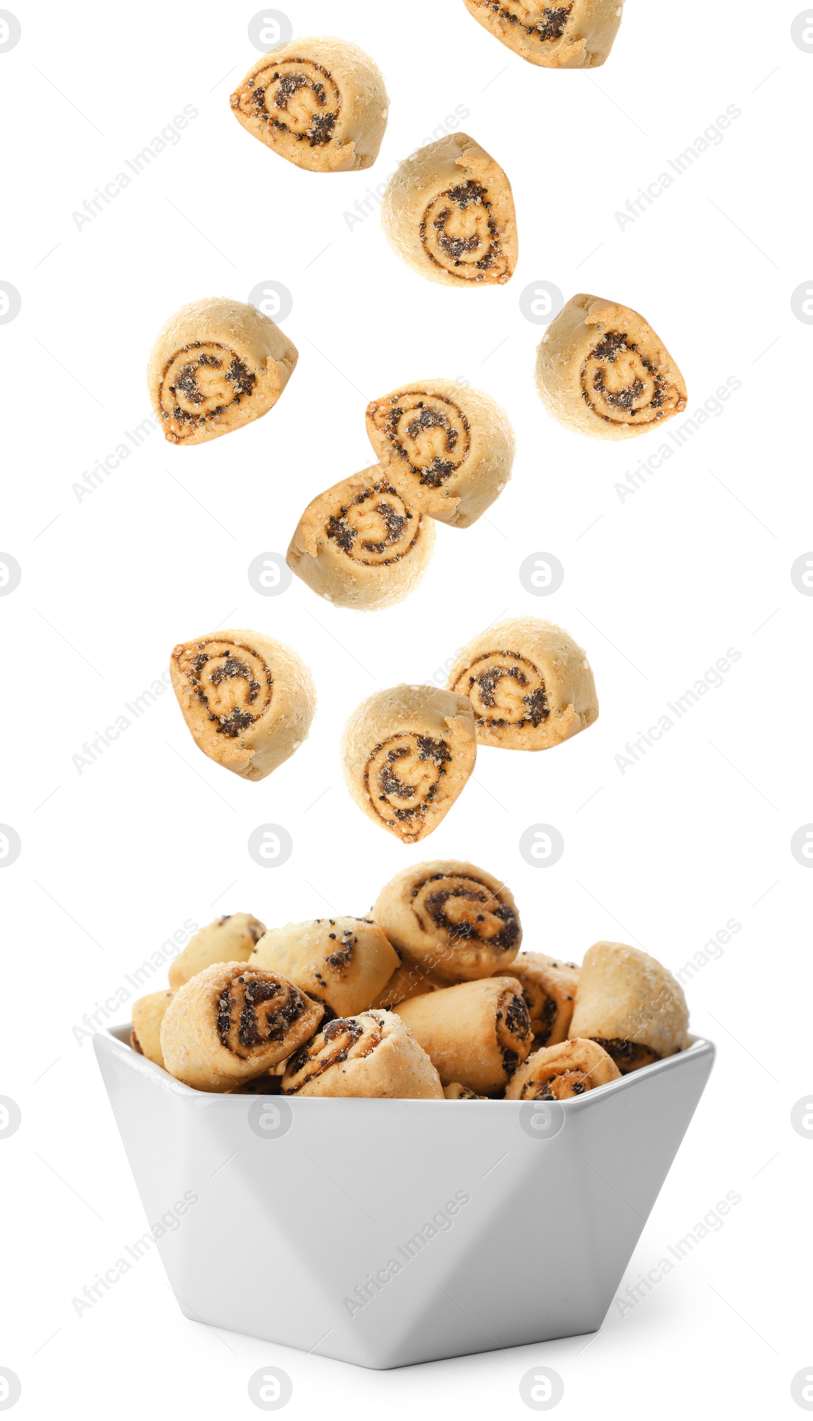 Image of Poppy seed cookies falling into bowl on white background