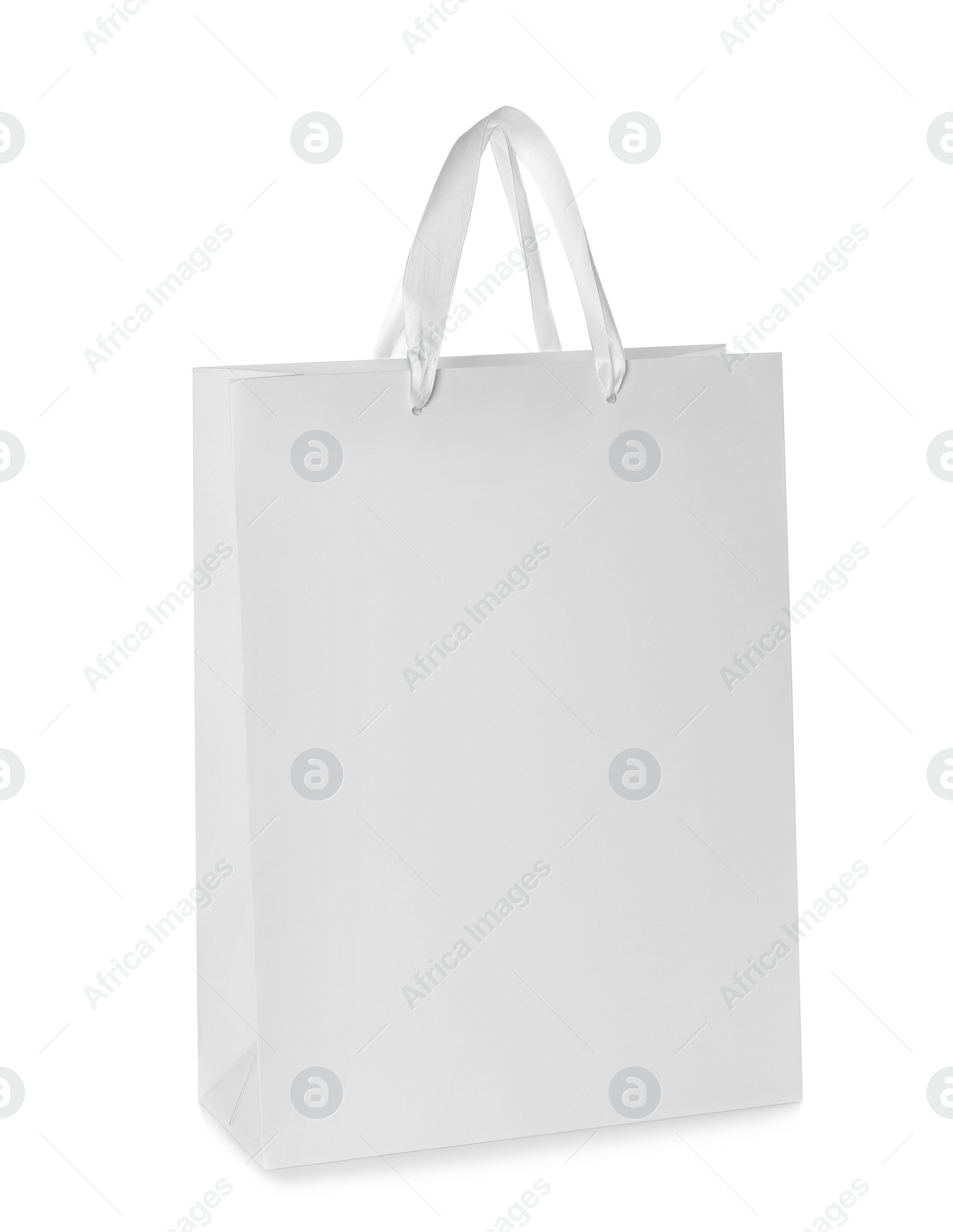 Photo of Paper shopping bag isolated on white. Mock up for design