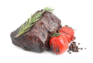 Photo of Piece of delicious grilled beef meat, tomatoes, peppercorns and rosemary isolated on white