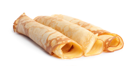 Photo of Rolled fresh thin pancakes isolated on white