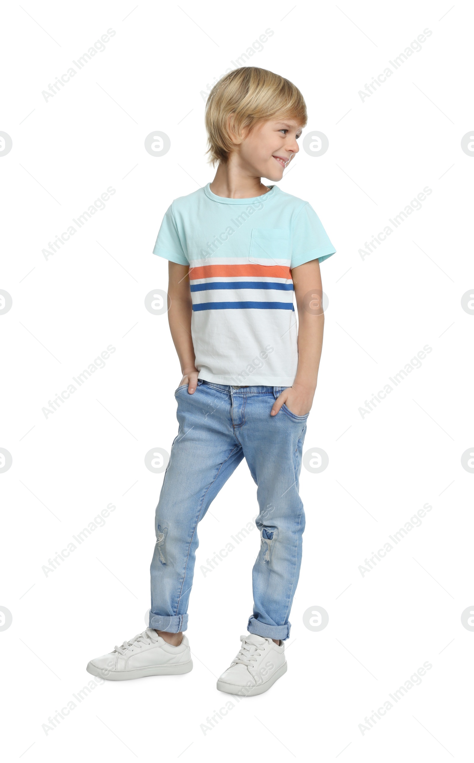 Photo of Cute little boy in casual outfit on white background