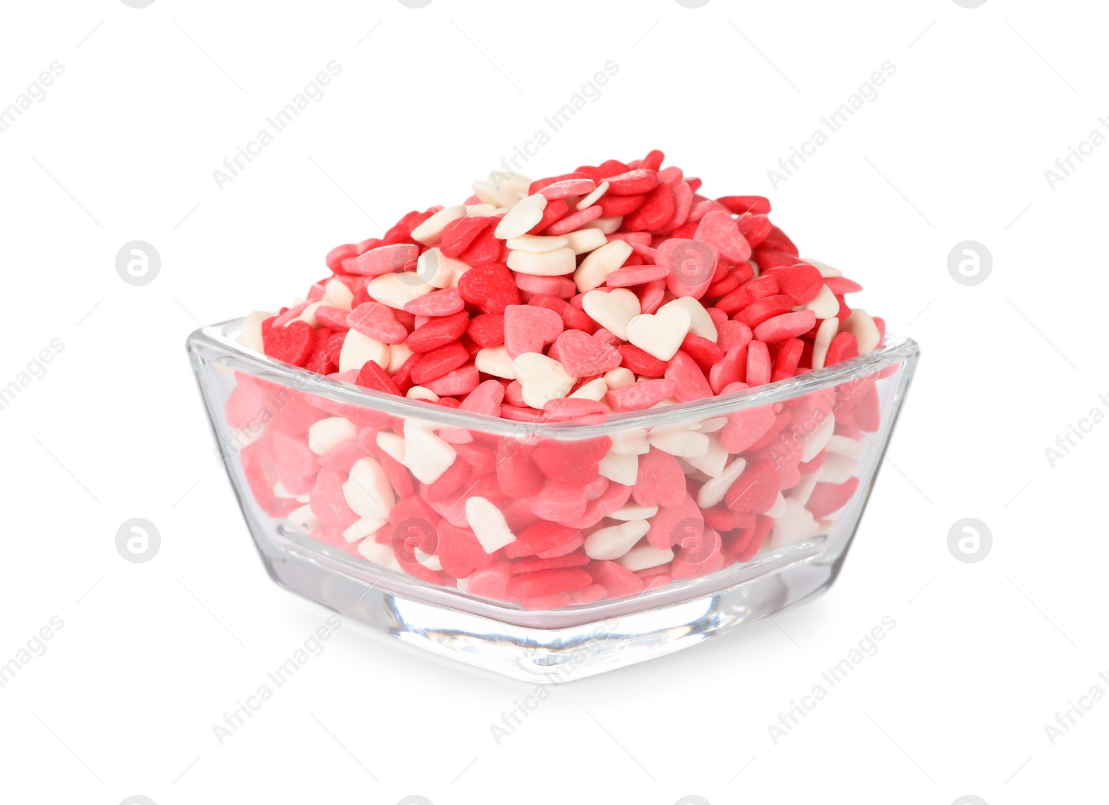 Photo of Bright heart shaped sprinkles in glass bowl isolated on white