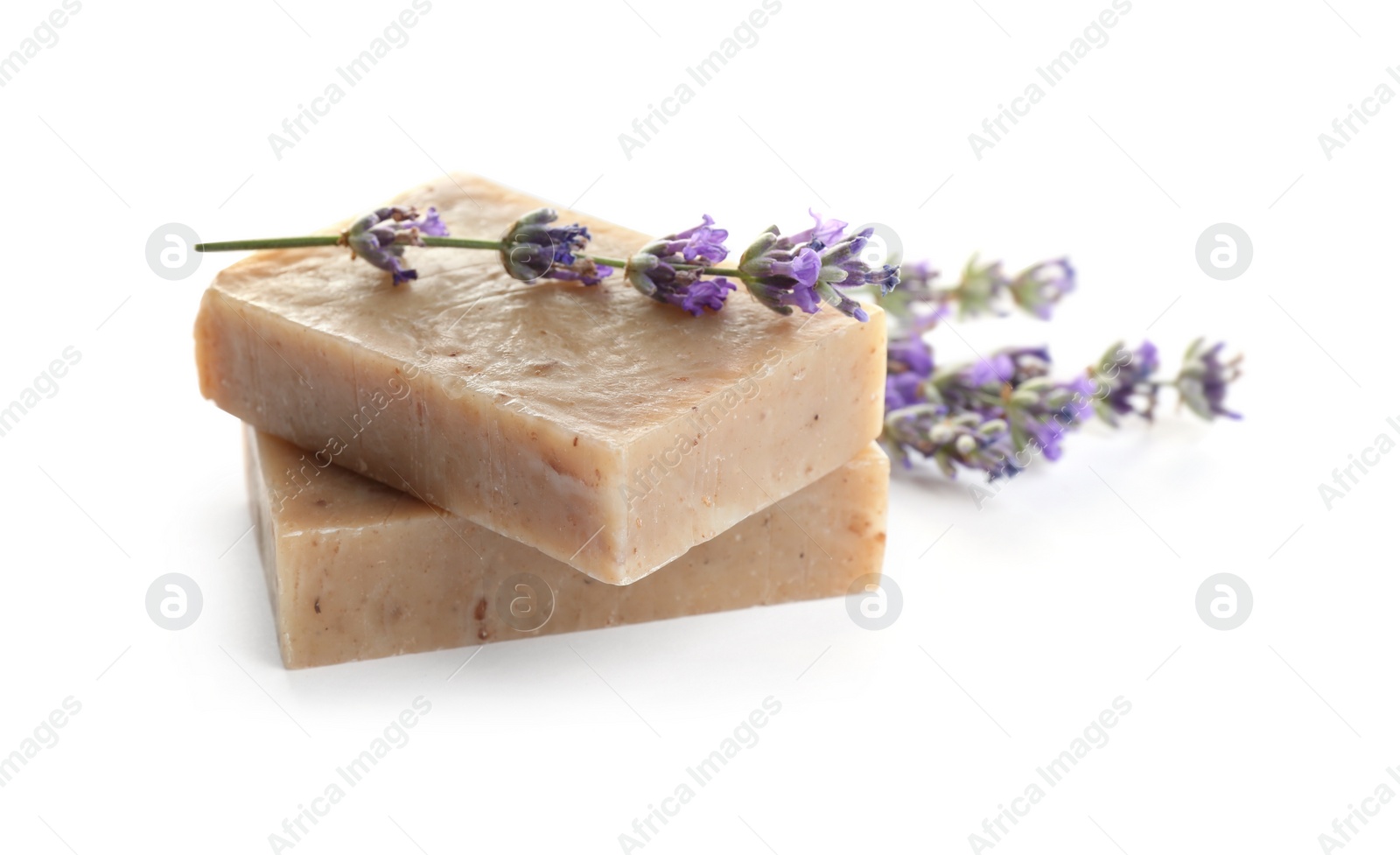 Photo of Hand made soap bars with lavender flowers on white background