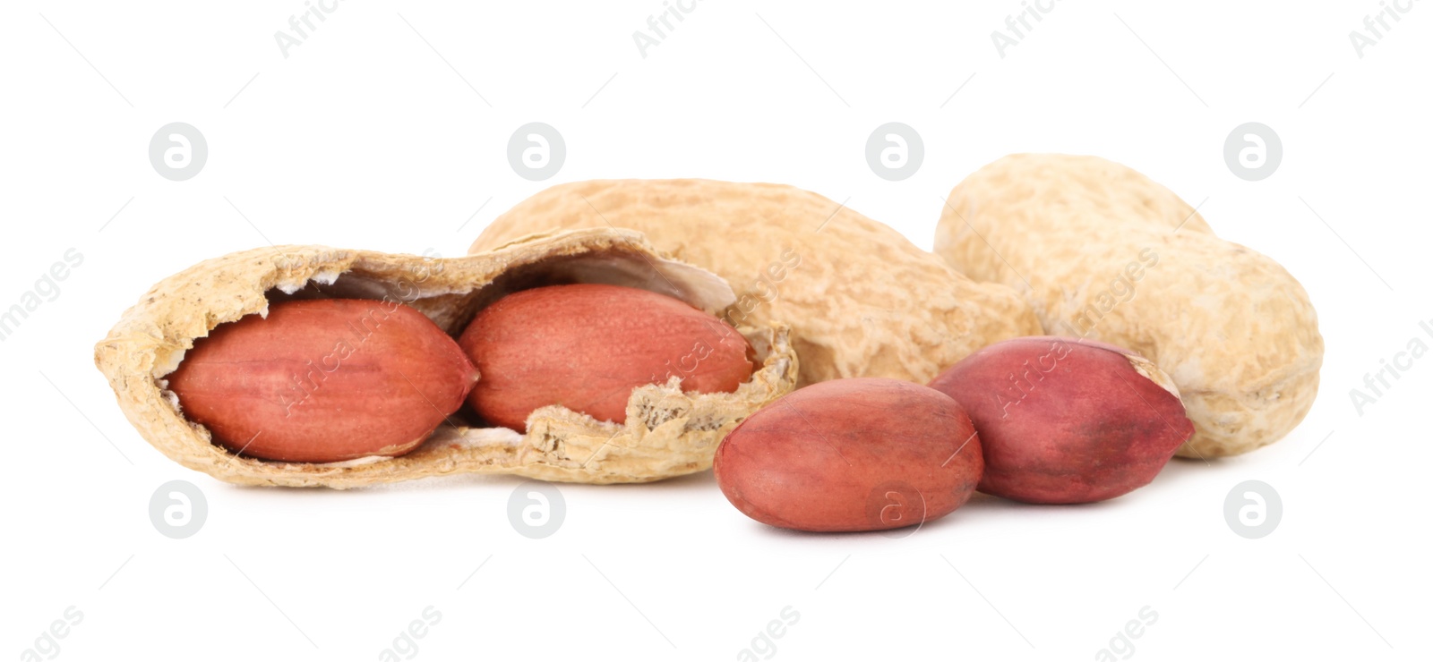 Photo of Fresh unpeeled peanuts isolated on white. Healthy snack