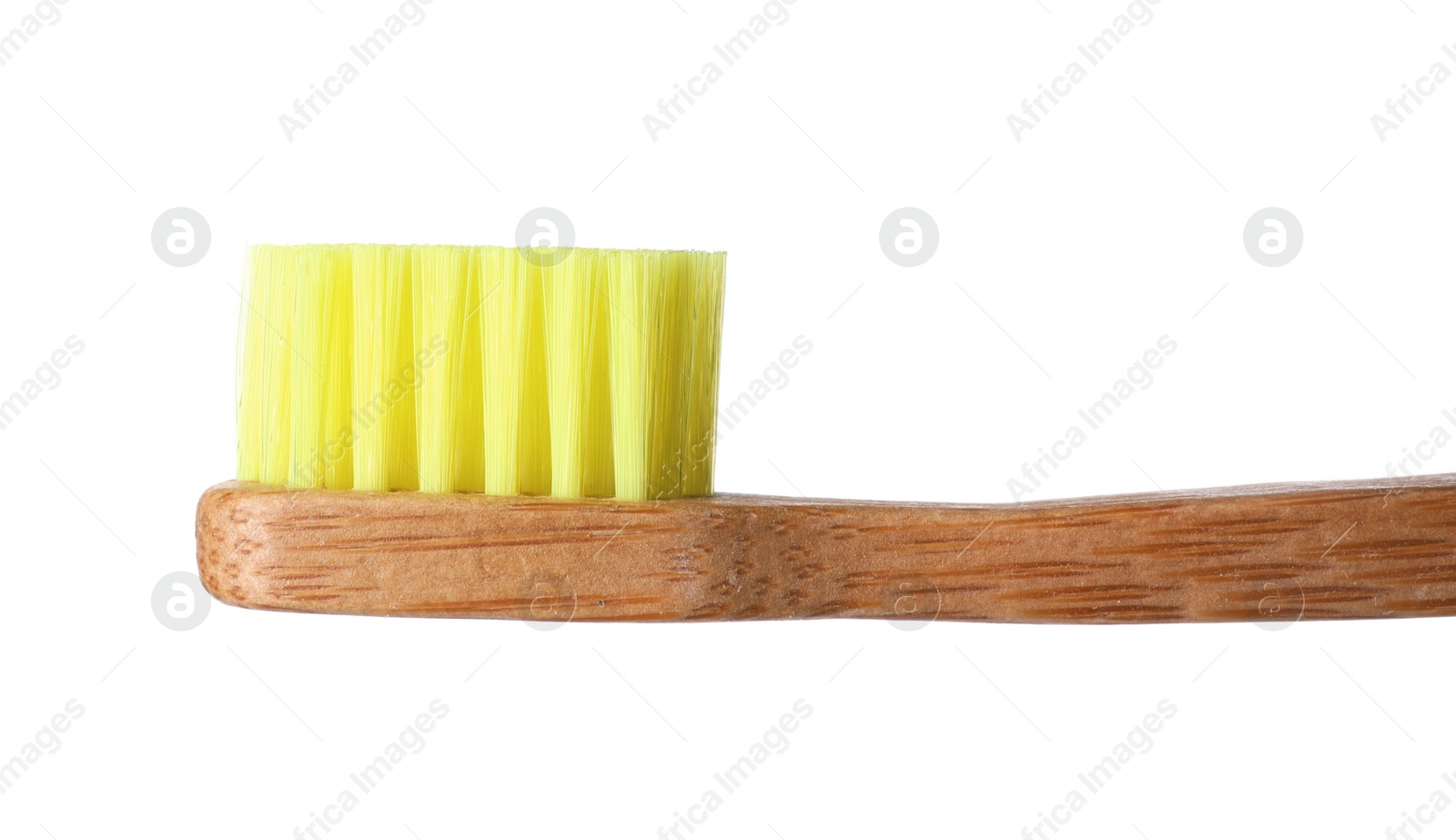 Photo of Toothbrush made of bamboo on white background, closeup