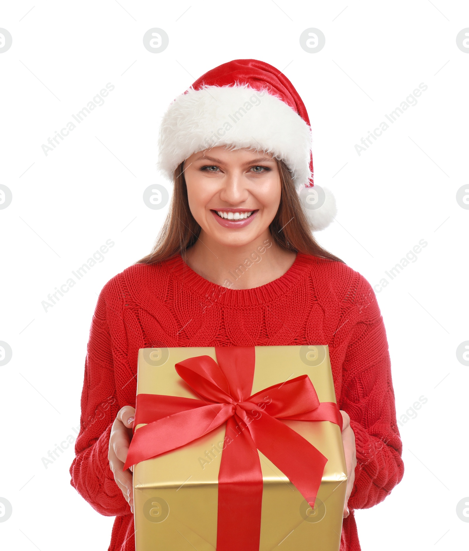 Photo of Happy young woman in Santa hat with Christmas gift on white background