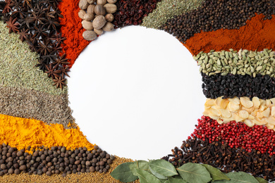 Photo of Frame made with different spices on white background, flat lay. Space for text