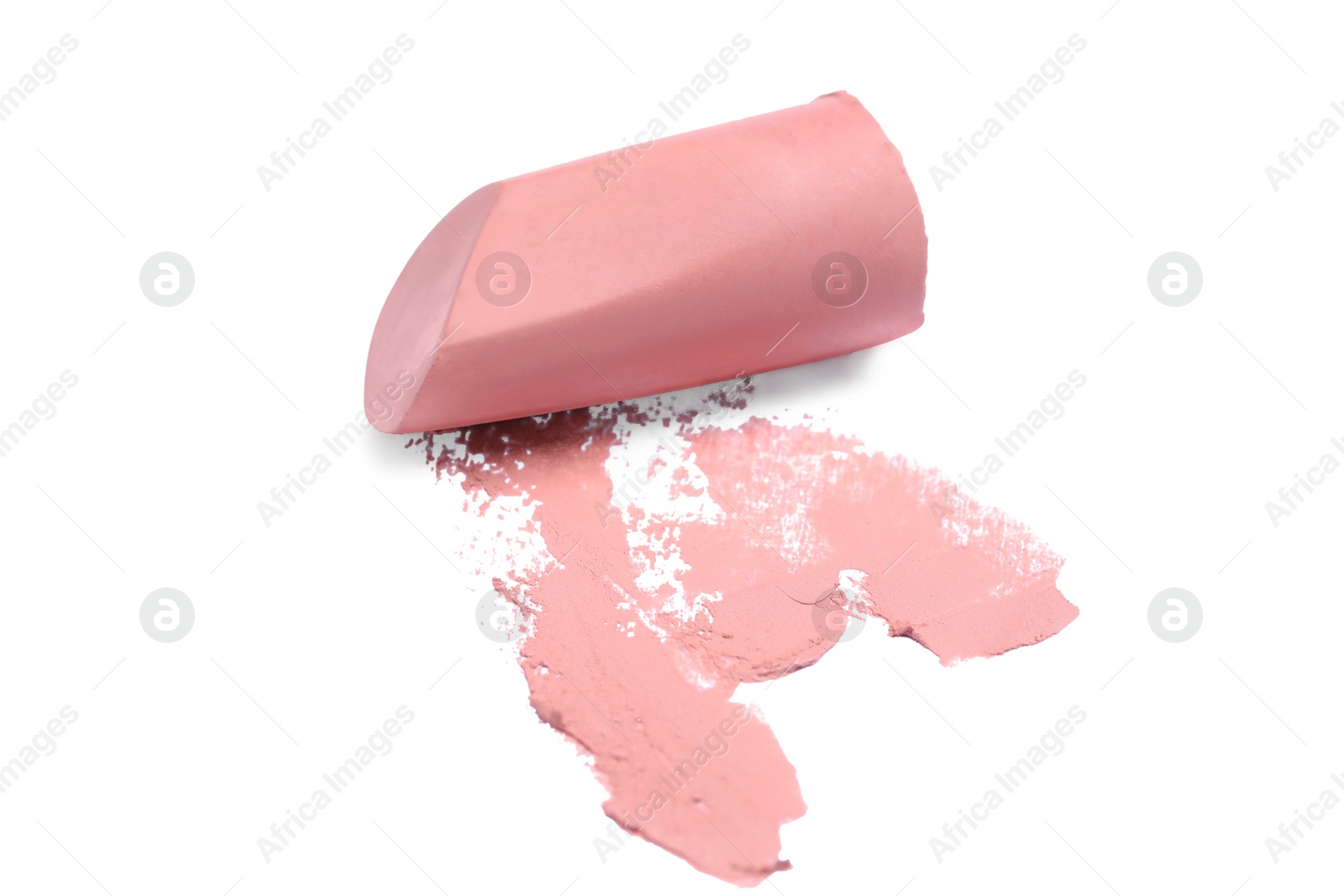 Photo of Nude color lipstick and smear on white background