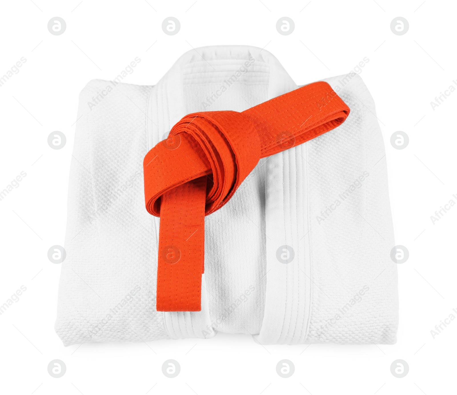 Photo of Orange karate belt and kimono isolated on white