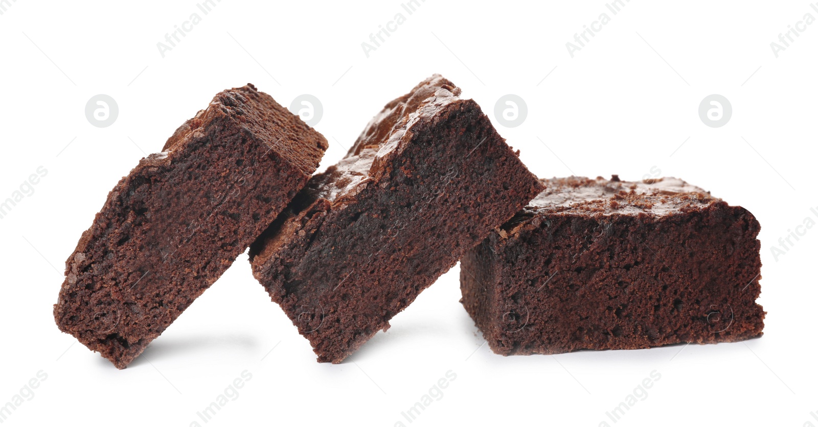 Photo of Pieces of fresh brownie on white background. Delicious chocolate pie