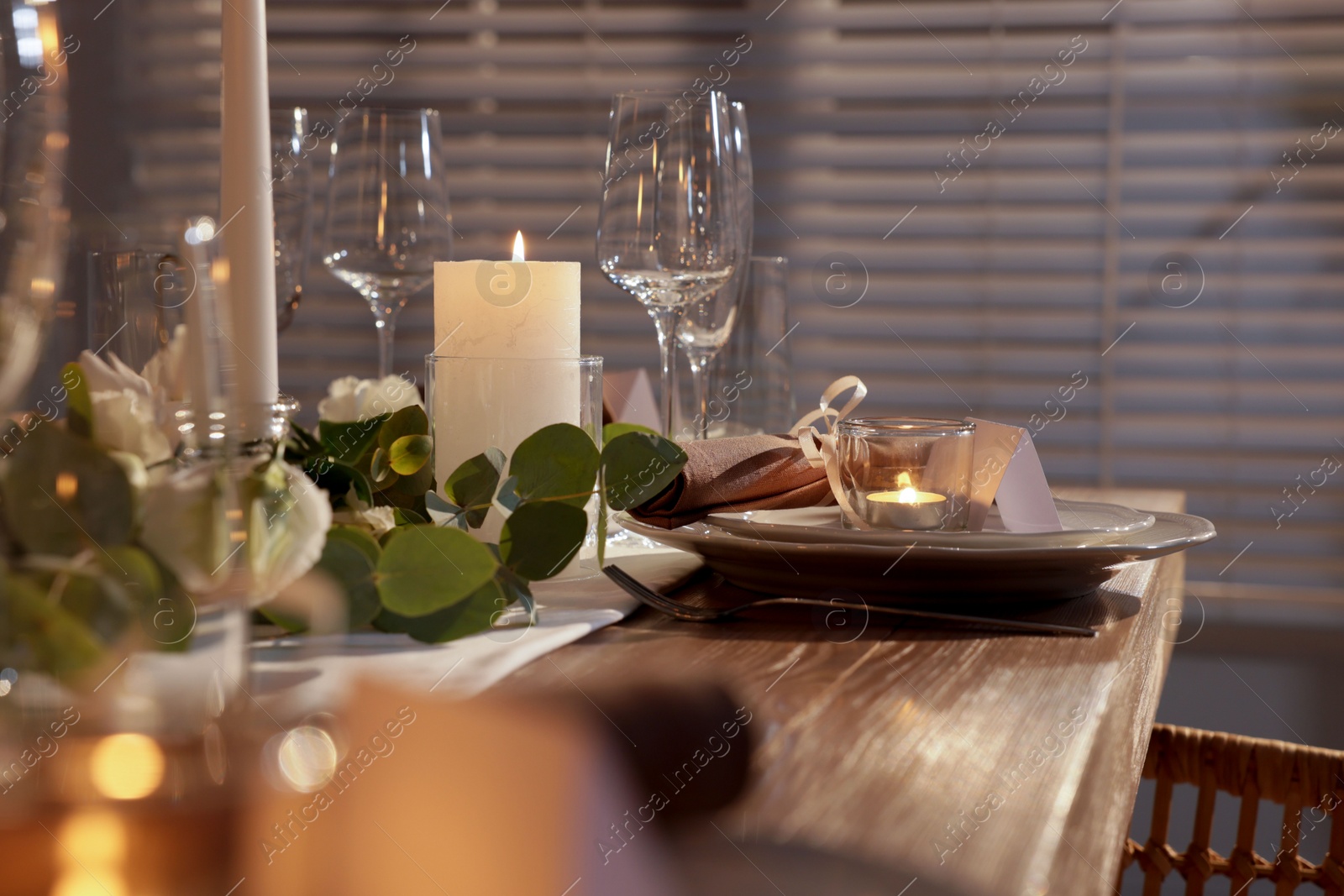 Photo of Festive table setting with beautiful tableware and decor indoors