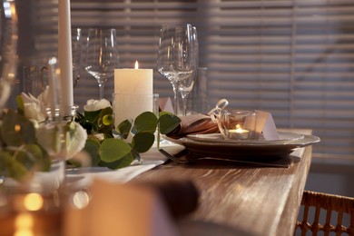 Festive table setting with beautiful tableware and decor indoors