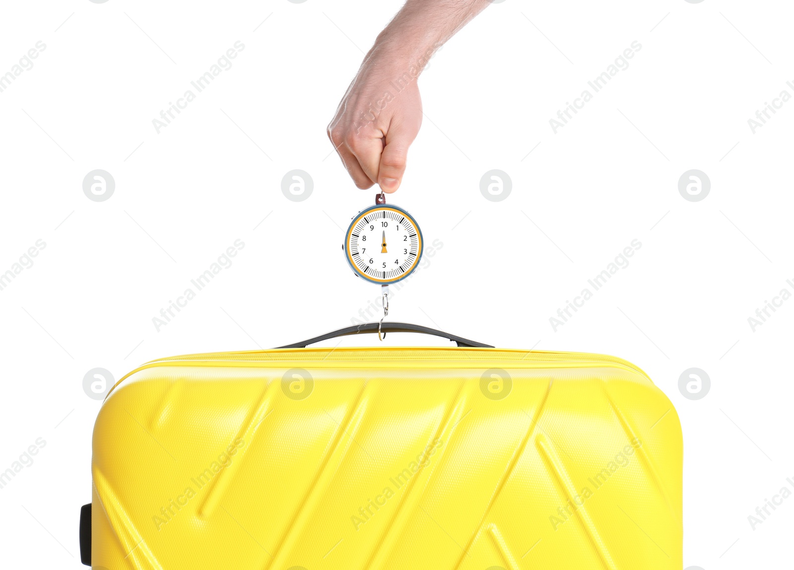 Photo of Man weighing stylish suitcase against white background, closeup