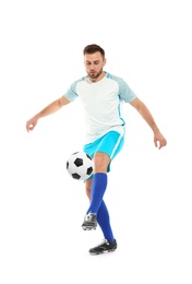 Young man playing football on white background