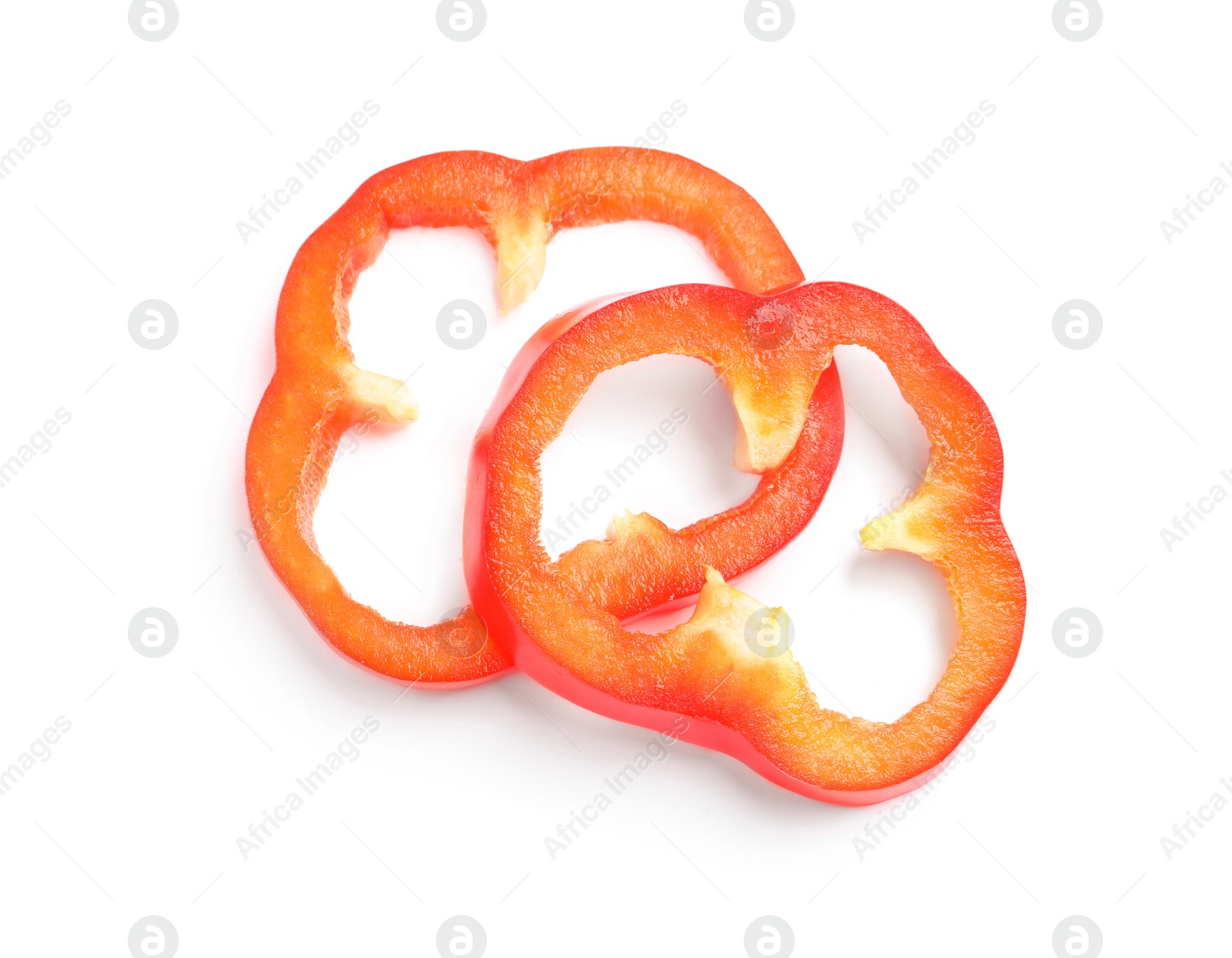 Photo of Slices of ripe red bell pepper on white background