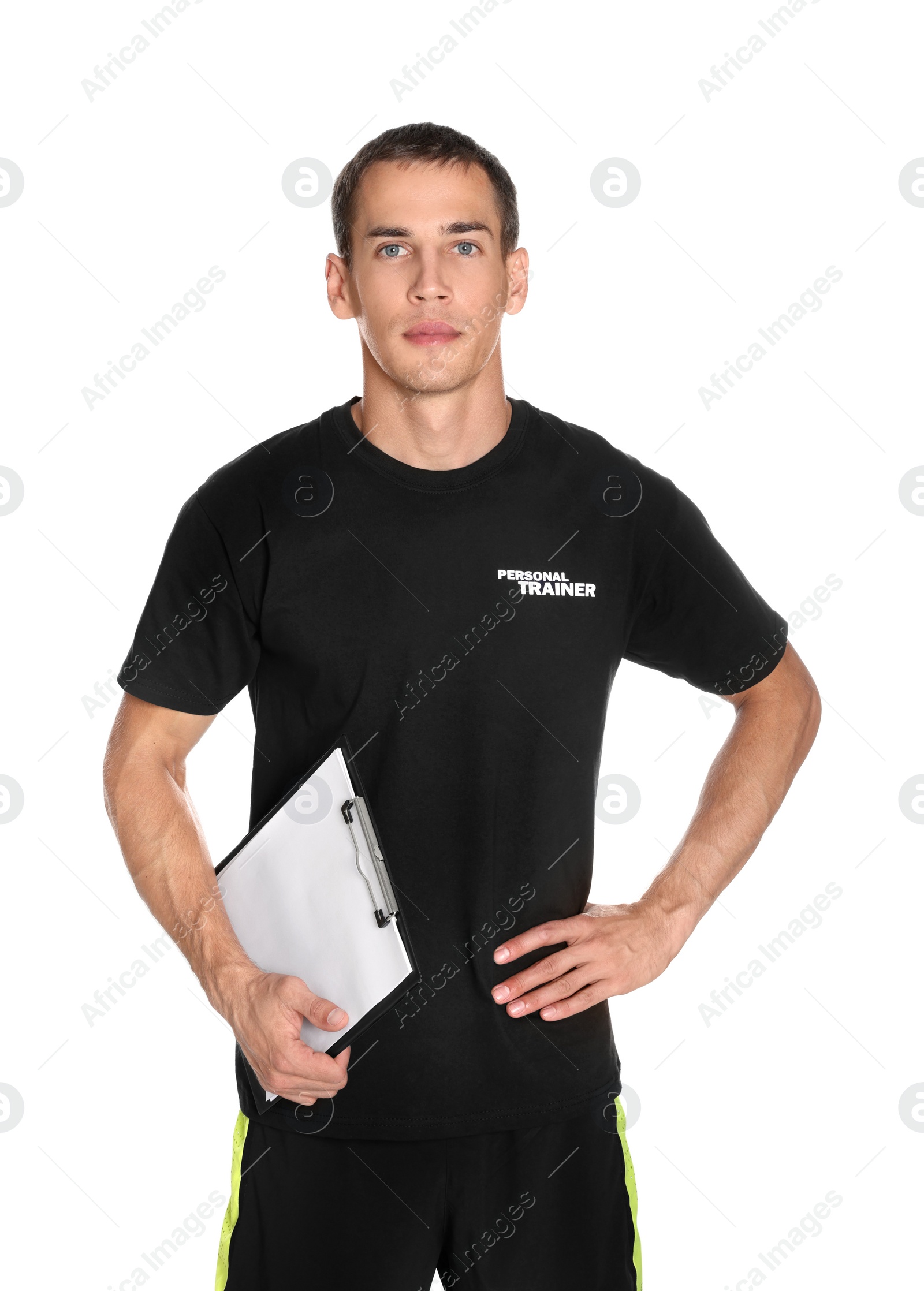 Photo of Portrait of personal trainer with clipboard on white background. Gym instructor