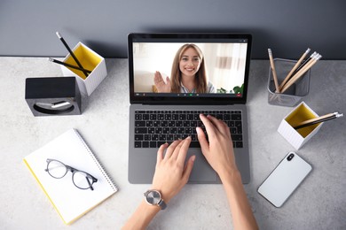 Image of Human resources manager conducting online job interview via video chat