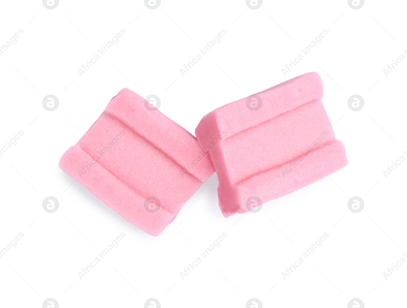 Photo of Tasty pink bubble gums isolated on white, top view