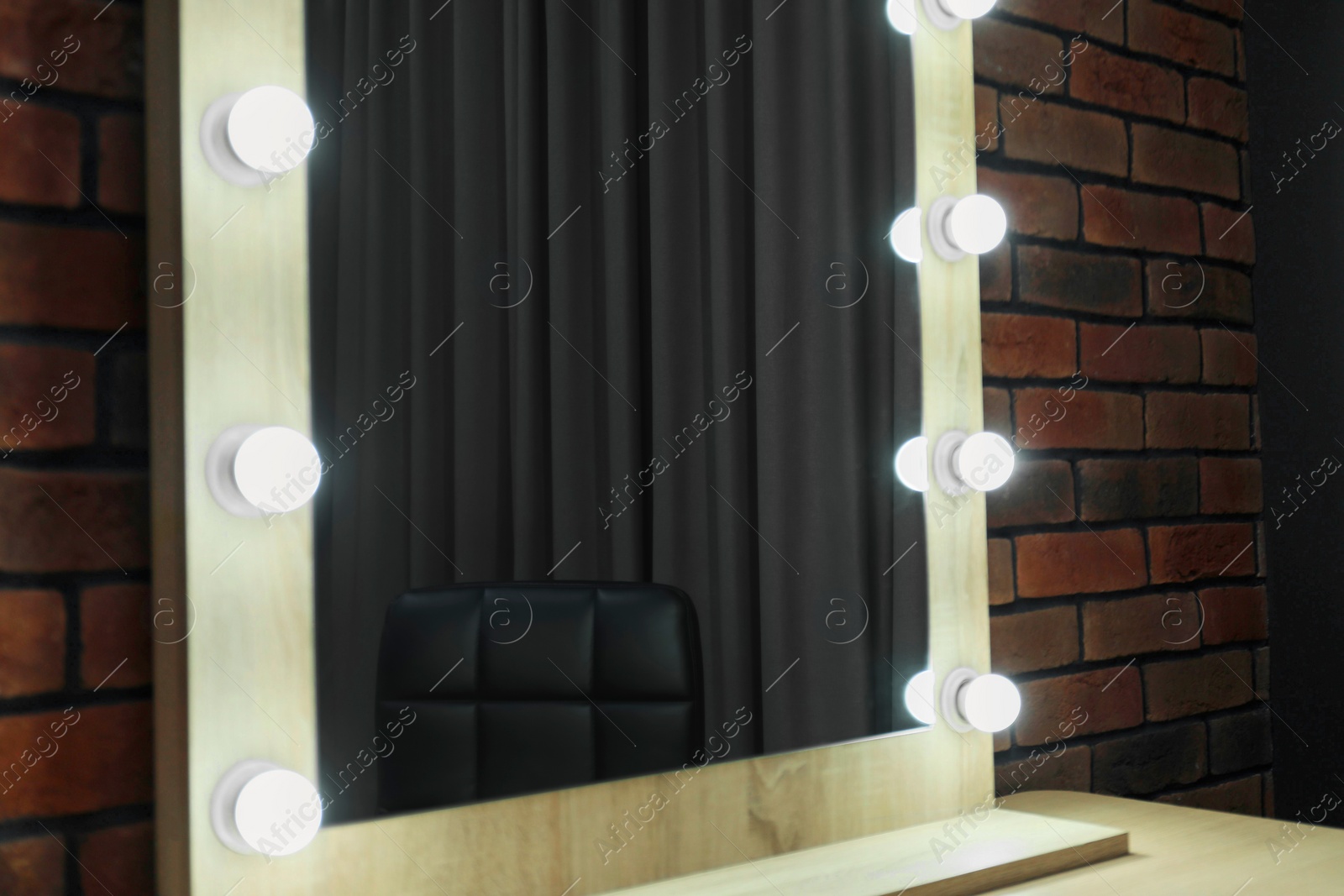 Photo of Mirror with light bulbs in makeup room