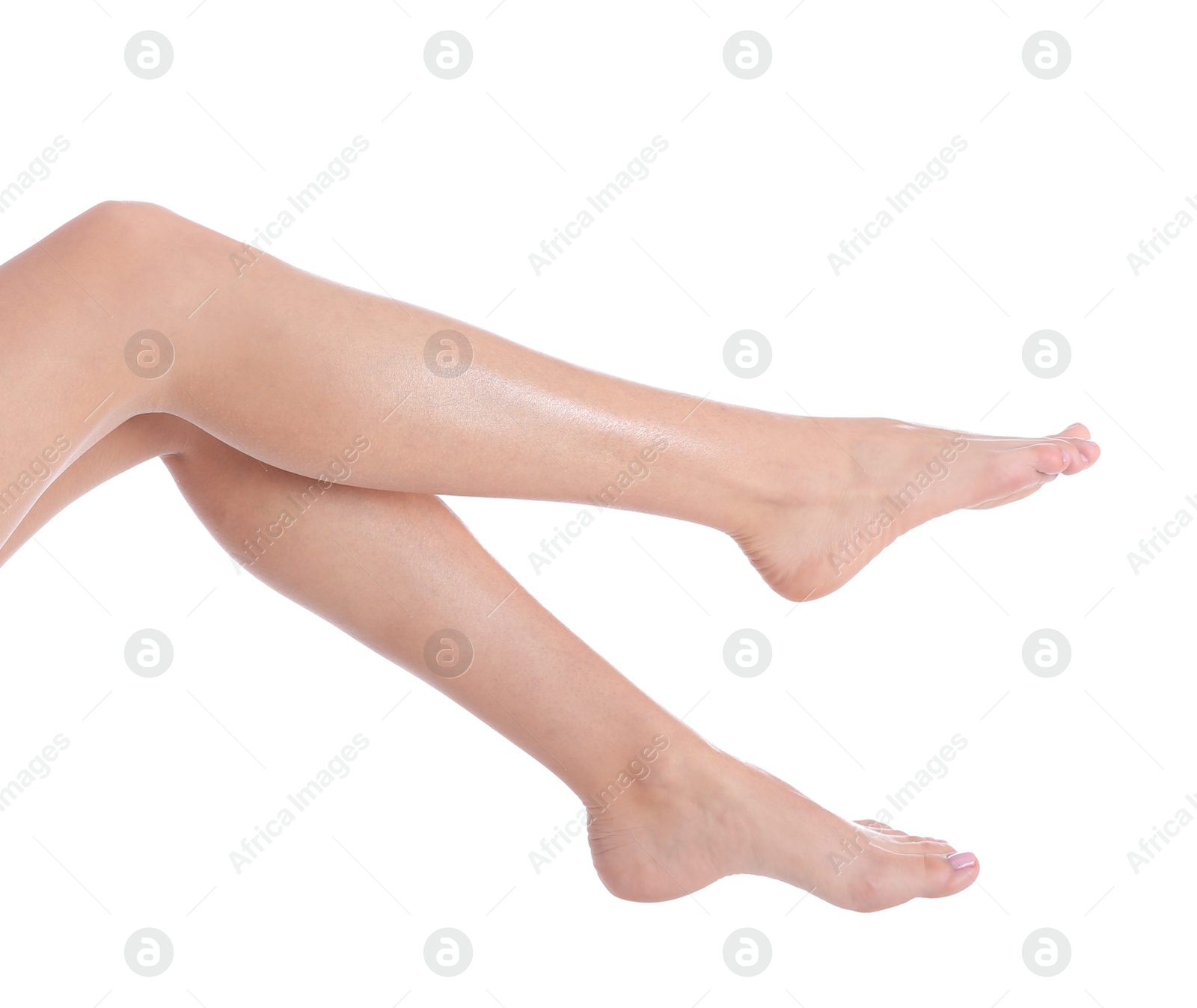 Photo of Woman with beautiful legs and feet on white background, closeup. Spa treatment