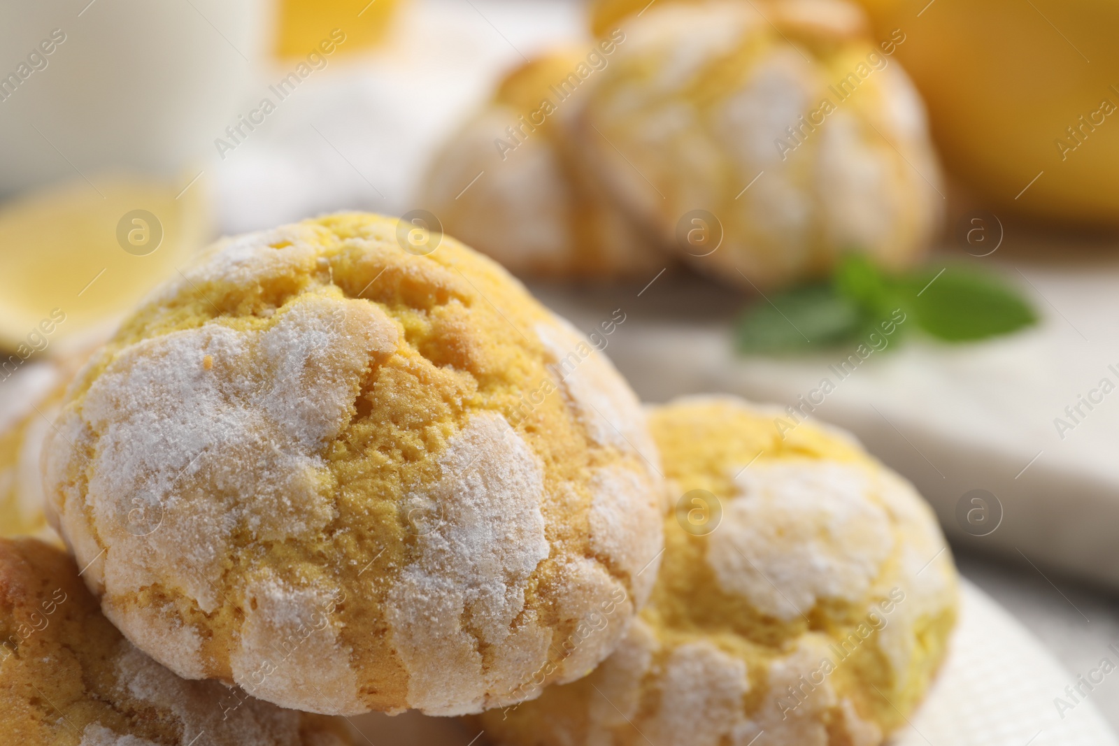 Photo of Fresh delicious lemon cookies on table, closeup