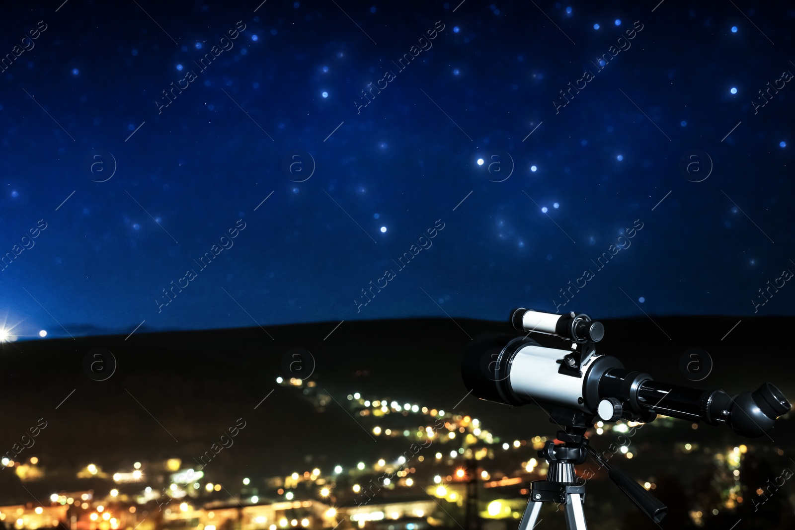 Photo of Picturesque view of city and modern telescope in night outdoors, closeup. Learning astronomy