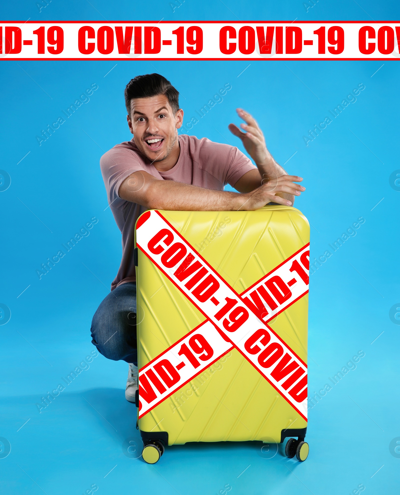 Image of COVID-19 pandemic, travel during coronavirus outbreak. Excited man with suitcase on blue background