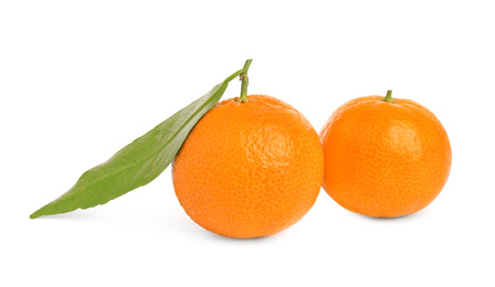 Photo of Fresh ripe juicy tangerines isolated on white