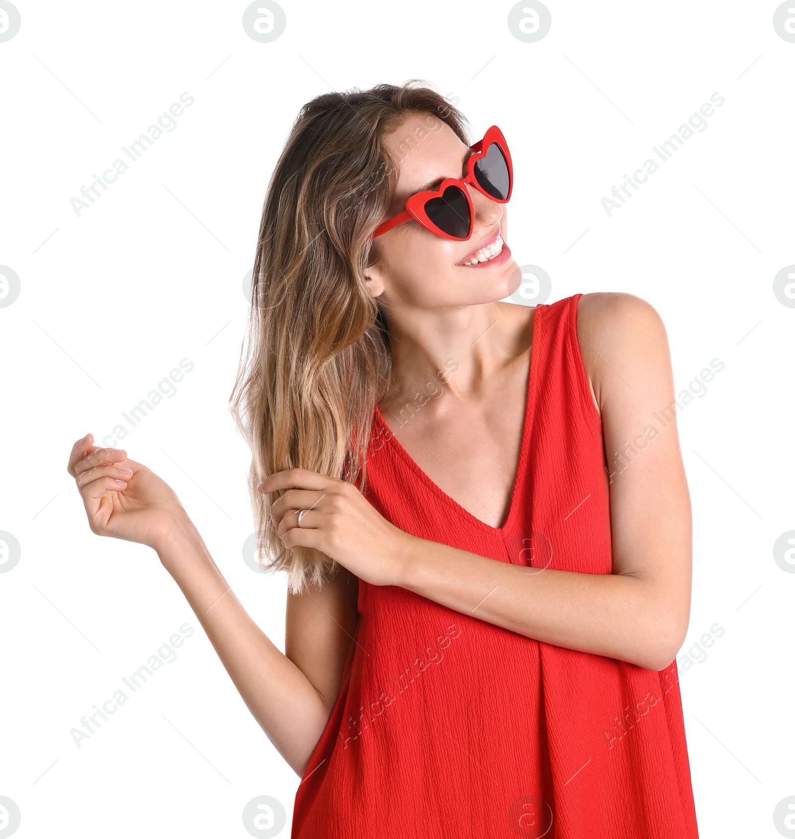 Photo of Young beautiful woman wearing heart shaped glasses on white background