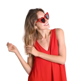 Young beautiful woman wearing heart shaped glasses on white background