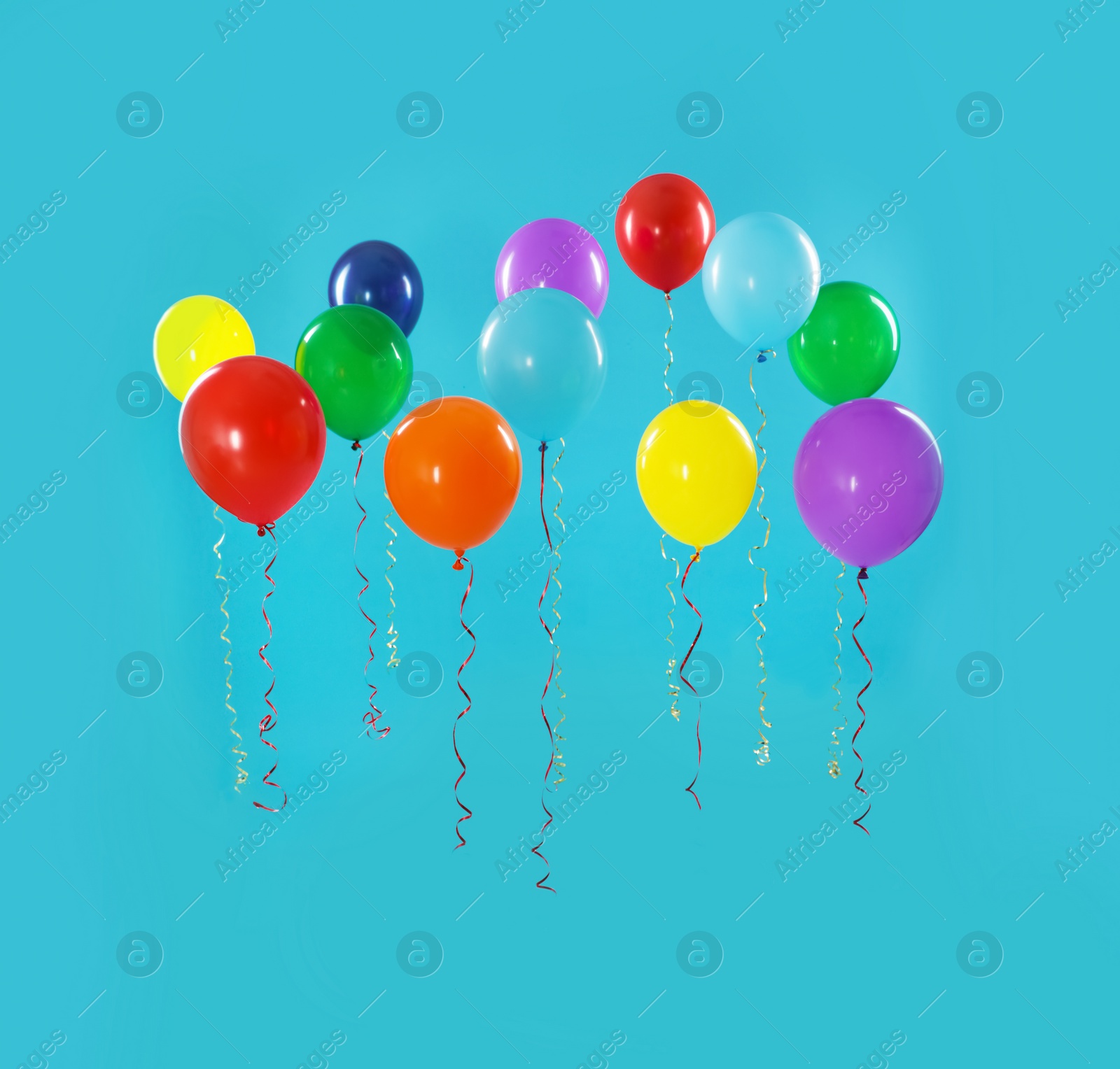 Photo of Bright balloons on color background. Celebration time