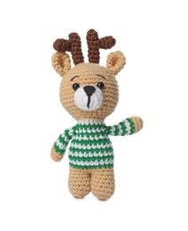 Photo of One crochet deer isolated on white. Children's toy