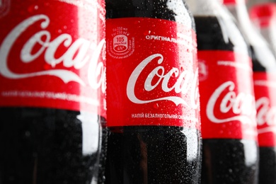 MYKOLAIV, UKRAINE - NOVEMBER 15, 2018: Bottles of Coca Cola as background, closeup