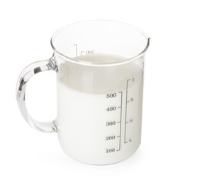 Photo of Fresh milk in measuring cup isolated on white