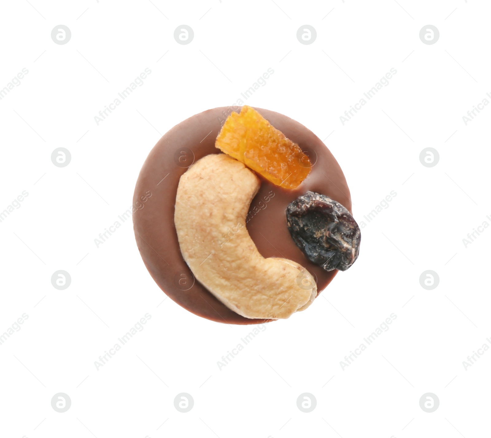 Photo of Delicious chocolate candy with cashew nut and dried fruits isolated on white, top view