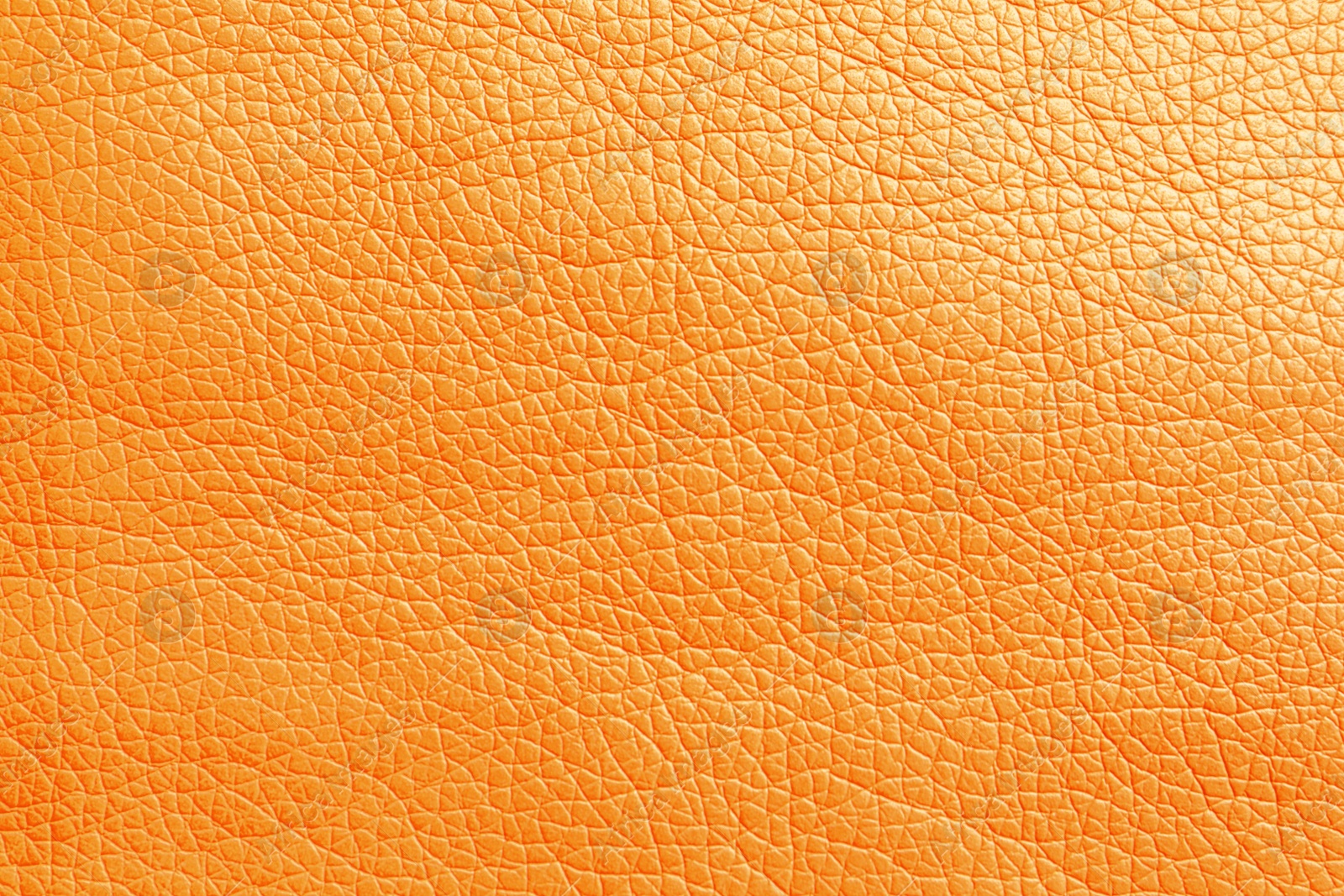 Image of Texture of orange leather as background, closeup