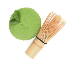 Photo of Green matcha powder, leaves and bamboo whisk isolated on white, top view