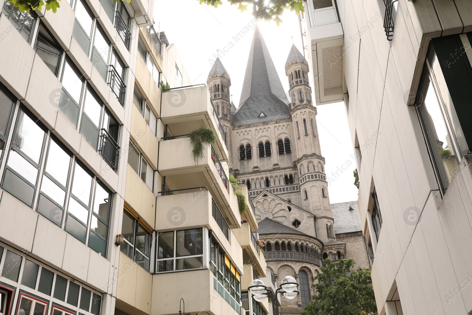 Photo of Cologne, Germany - August 28, 2022: Beautiful modern buildings on city street