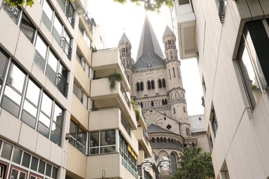 Cologne, Germany - August 28, 2022: Beautiful modern buildings on city street