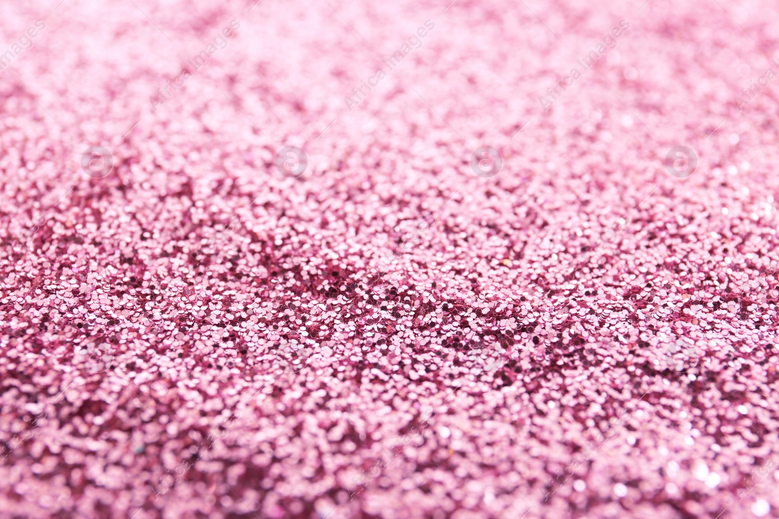 Photo of Texture of rose glitter fabric as background