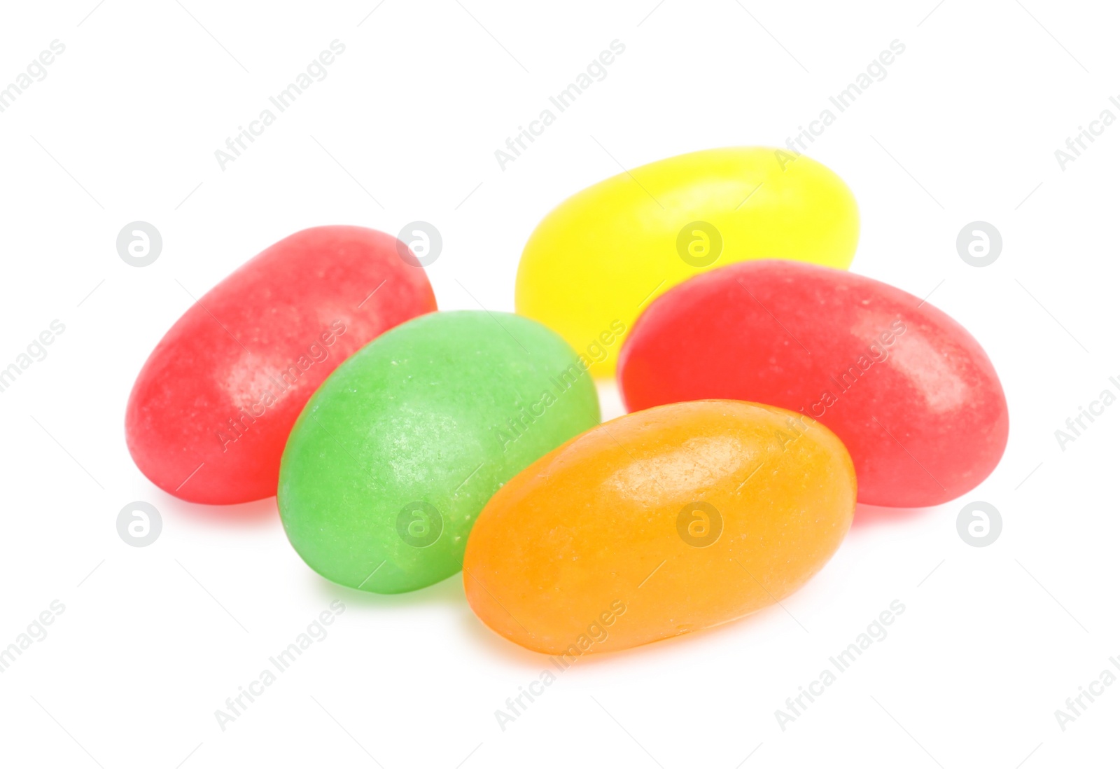 Photo of Delicious colorful jelly beans isolated on white